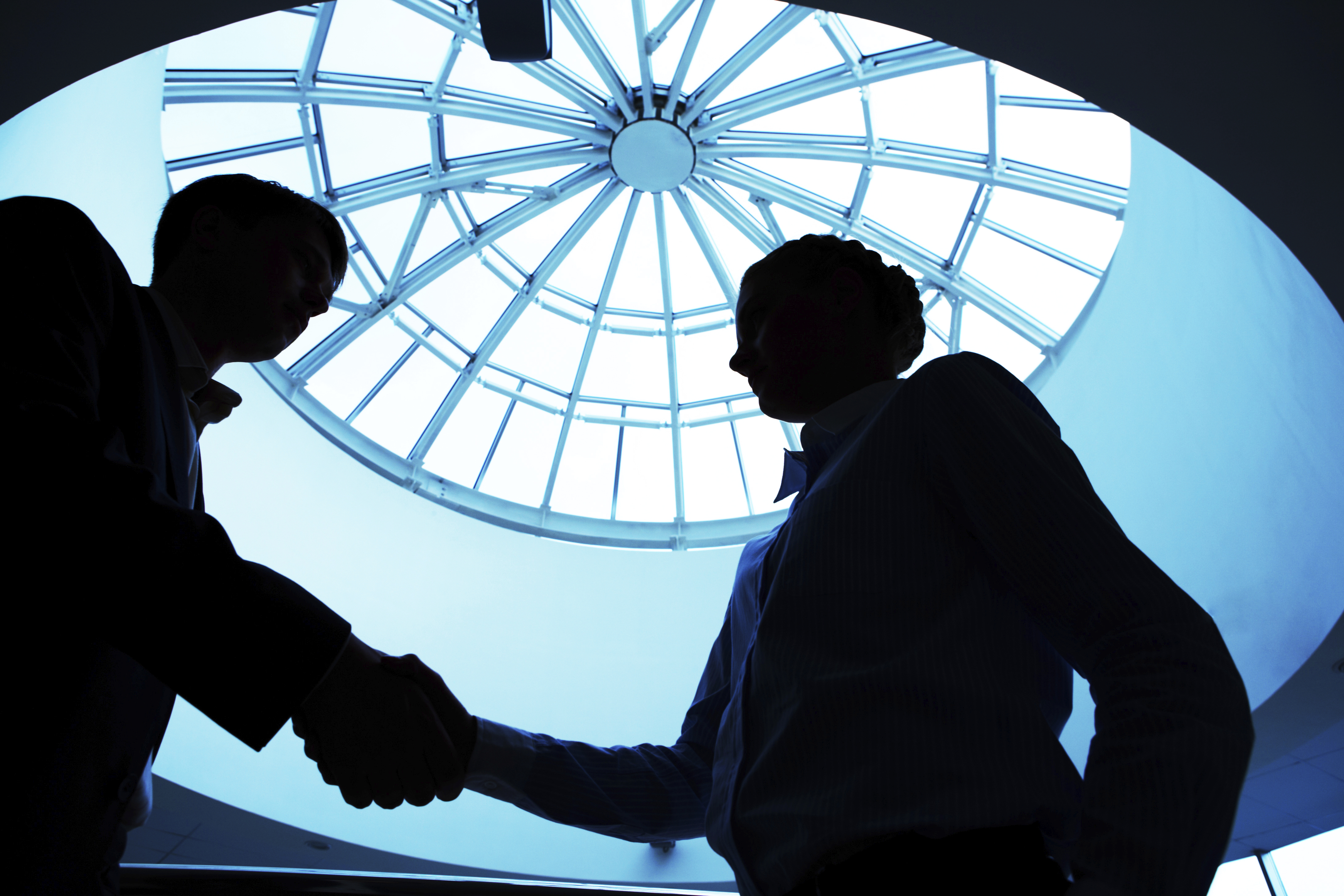 Close-up of business people making agreement in the office