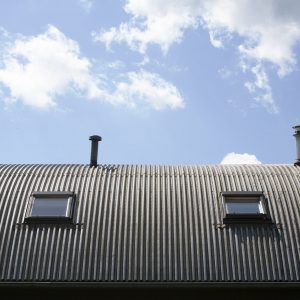 Metal roof Metal roof with windows and chimneys